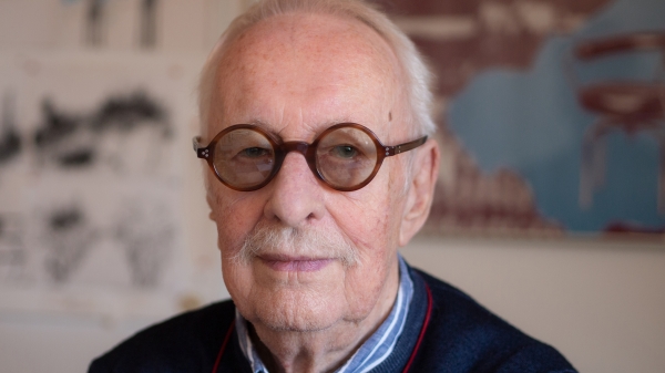 Porträtfoto
                                          eines älteren Herren mit Brille